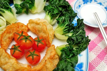 Chinese dumplings and vegetables