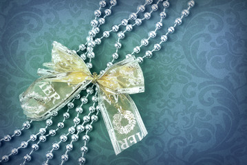 Blue background with gold bow