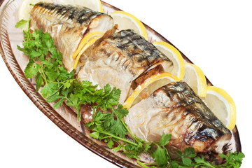 grilled baked fish with lemon and parsley isolated on white