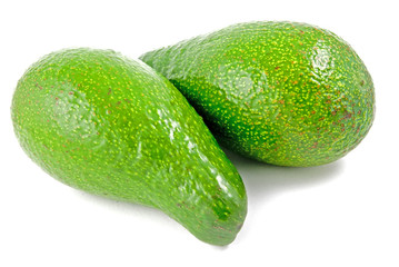 two avocadoes on white background