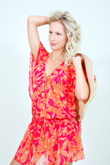 studio shot of beautiful woman in summer clothes