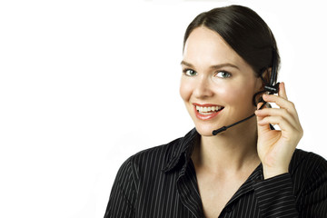 Attractive woman with headset isolated over white