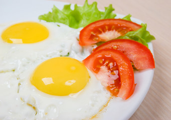 Delicious egg with vegetable close up