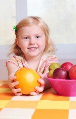 Fototapeta premium little girl with fruit