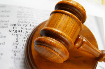 closeup of a court gavel and legal definition