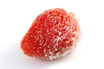 Frozen strawberry in frost