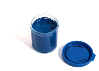 container with blue paint