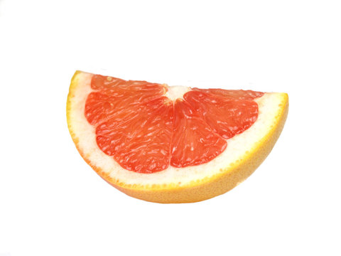 Grapefruit slice on white background