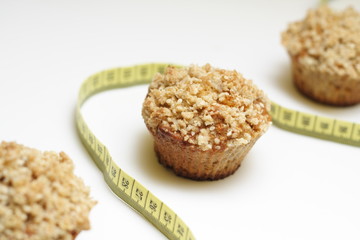 Crunchy carrot muffins with measuring tape