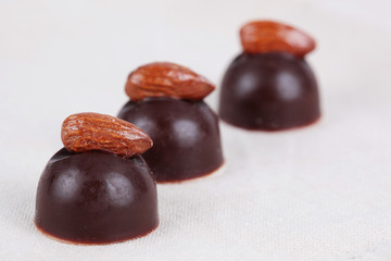 Chocolates close up with almonds
