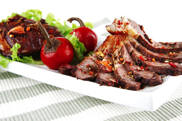 beef meat on ceramic plate