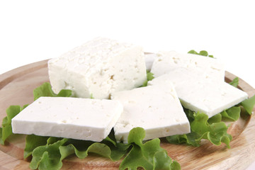 feta cheese on wooden plate