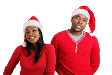 African american christmas couple with santa hats