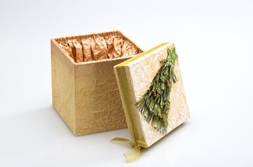 Decorative Christmas gift box opened on white background