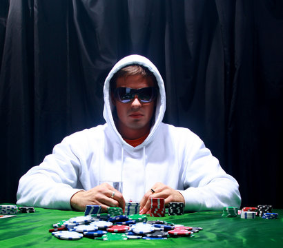 a poker player sitting at a table