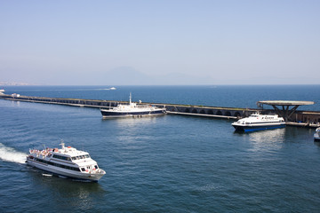 Fototapeta na wymiar Large Ferries in Bay of Naples