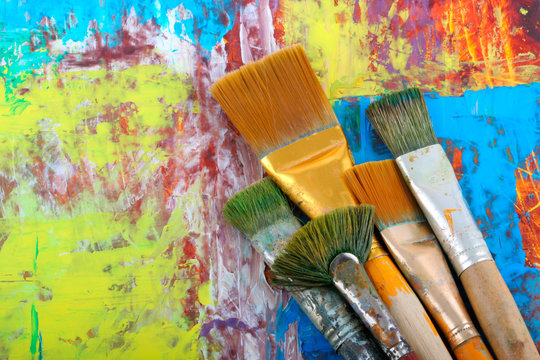 Set brushes on painted background.