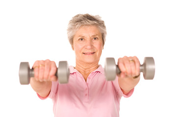 Mature lady lifting weights