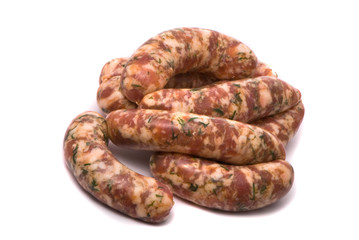 Raw sausages on white background