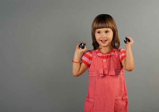 Cute little girl with In-Yan balls
