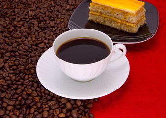 Obraz premium Coffee cup and grain