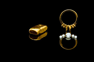 An unmounted gold ring with diamonds ready for setting