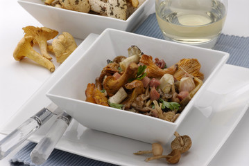 Assorted mushrooms in garlic sauce.