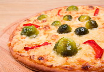 vegetable pizza with brussels sprouts.