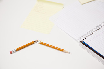 Broken Pencil and Papers