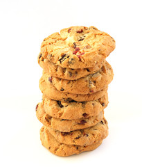 Stack of hazelnut cookies with chocolate and cranberries