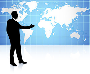 Young business man pointing on world map background