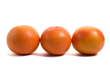 three grapefruits