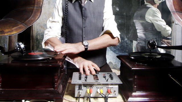an retired man djs with gramophones.. go grandpa!!