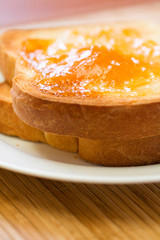 Fototapeta na wymiar Toast and Apricot Preserves