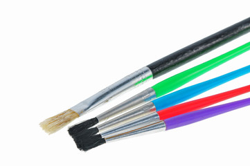 Fototapeta premium colorful paint brush on the table