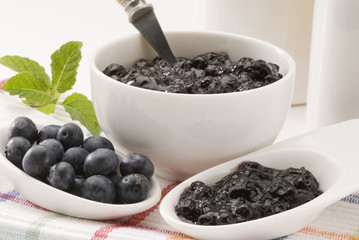 Fototapeta na wymiar Blueberries and blueberry jam.