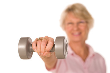 Retired lady lifting weights
