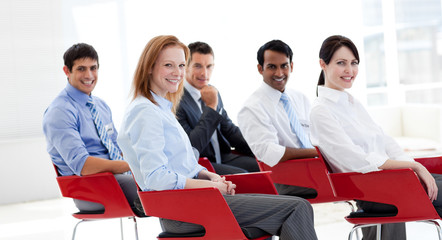 Portrait of business people at a conference