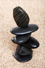 Fototapeta na wymiar closeup zen stones in sand
