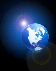 Fototapeta na wymiar Globe on blue glowing background with lens flare