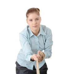 Business woman pulling the rope