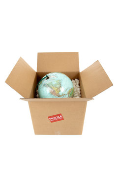 Globe in a box with a fragile sticker