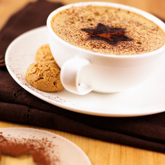 Coffee with cocoa topping