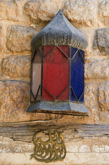 Old classical arab lantern with arab text