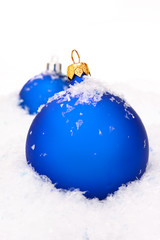 Christmas balls with snow close-up.