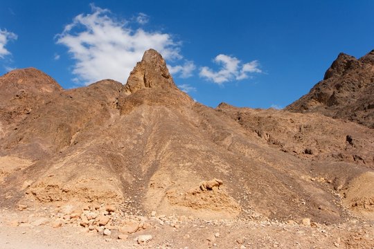 Scenic triangular rocks in stone desert near Eilat in Israel