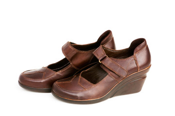 Brown boots isolated on the white background