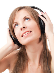 Fototapeta premium Girl with headphones listening to music