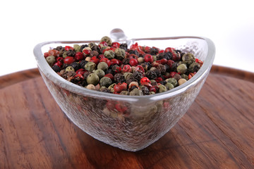 dry pepper over white