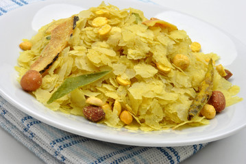 dry roasted chevda on a white plate